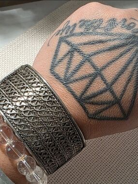 Intricate Silver-Tone Wide Cuff Bracelet - Women